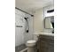 Modern bathroom with subway tile shower, black fixtures, and updated vanity for a spa-like experience at 2479 Peachtree Ne Rd # 317, Atlanta, GA 30305