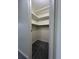Carpeted closet with installed shelving for organized storage at 2479 Peachtree Ne Rd # 317, Atlanta, GA 30305