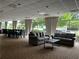 Spacious common area with comfortable couches, dining table and chairs, and lots of natural light at 2479 Peachtree Ne Rd # 317, Atlanta, GA 30305