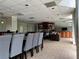 Elegant community lounge with dining table, comfortable seating, and a library at 2479 Peachtree Ne Rd # 317, Atlanta, GA 30305