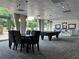 Spacious lounge with billiard table, dining space, and ample seating for residents at 2479 Peachtree Ne Rd # 317, Atlanta, GA 30305