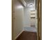 Hallway leading to carpeted rooms and closets with laminate flooring in the foreground at 2479 Peachtree Ne Rd # 317, Atlanta, GA 30305