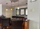 A stylish kitchenette boasting granite countertops, modern appliances, and contemporary pendant lighting at 2479 Peachtree Ne Rd # 317, Atlanta, GA 30305