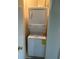 An interior laundry closet with a stackable washer and dryer unit at 2479 Peachtree Ne Rd # 317, Atlanta, GA 30305