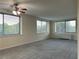 Bright living room with multiple large windows allowing natural light to flow in at 2479 Peachtree Ne Rd # 317, Atlanta, GA 30305