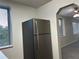 A view of a stainless steel refrigerator within the living room of a home at 2479 Peachtree Ne Rd # 317, Atlanta, GA 30305