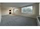 Living room featuring view into the kitchen and several windows providing lots of light at 2479 Peachtree Ne Rd # 317, Atlanta, GA 30305