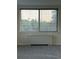Bright window offering a beautiful city view and natural light, enhancing the living space at 2479 Peachtree Ne Rd # 317, Atlanta, GA 30305