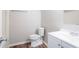 Bathroom featuring a toilet, vanity with sink, and modern fixtures at 502 Snowfall Ter, Palmetto, GA 30268
