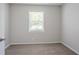 Bedroom with neutral carpet and natural light from a window with blinds at 502 Snowfall Ter, Palmetto, GA 30268