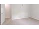 Bedroom with fresh paint, soft carpet, and an open doorway at 502 Snowfall Ter, Palmetto, GA 30268