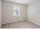 Bedroom featuring fresh paint, neutral carpet, and natural light at 502 Snowfall Ter, Palmetto, GA 30268