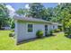 Charming home featuring a well maintained lawn and lush greenery at 502 Snowfall Ter, Palmetto, GA 30268