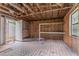 Unfinished shed interior, perfect for storage or workshop with exposed wood and shelving at 502 Snowfall Ter, Palmetto, GA 30268