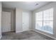 Bedroom with a double closet and window at 5033 Kens Ct, Stockbridge, GA 30281