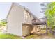 A view of the side of the house showing a walk out deck at 5033 Kens Ct, Stockbridge, GA 30281