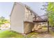 A view of the side of the house showing a walk out deck at 5033 Kens Ct, Stockbridge, GA 30281