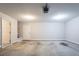 Spacious two car garage with white walls, and a door leading to the inside at 5033 Kens Ct, Stockbridge, GA 30281
