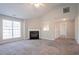 Spacious living room features a fireplace, vaulted ceilings, and lots of natural light at 5033 Kens Ct, Stockbridge, GA 30281