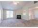 Spacious living room features a fireplace, vaulted ceilings, and lots of natural light at 5033 Kens Ct, Stockbridge, GA 30281
