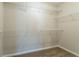 Walk-in closet with built-in wire shelving for optimal storage space at 5033 Kens Ct, Stockbridge, GA 30281