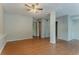 An open living area with hardwood floors featuring a large support column at 5383 Forest East Ln, Stone Mountain, GA 30088