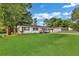 Well-manicured front yard with mature trees and a charming house at 288 Valerie Cir, Hiram, GA 30141