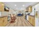 Bright living space with an open floor plan, featuring a cozy seating area adjacent to the kitchen and dining area at 288 Valerie Cir, Hiram, GA 30141