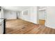 Spacious living room featuring hardwood floors, white walls and open floor plan at 4103 Laynewood Cir, Tucker, GA 30084