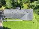 An aerial view shows the home's roof, landscaping, and patio area at 4581 Newcastle Cir, Lithonia, GA 30038