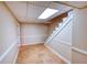 Spacious finished basement with staircase and access to additional basement rooms at 4581 Newcastle Cir, Lithonia, GA 30038