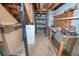 Unfinished basement workshop with work bench and open ceiling at 4581 Newcastle Cir, Lithonia, GA 30038