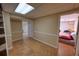 Finished basement area leading to additional rooms and staircase at 4581 Newcastle Cir, Lithonia, GA 30038