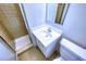 Bathroom featuring shower, toilet, vanity and sink with tile flooring and mirror at 4581 Newcastle Cir, Lithonia, GA 30038