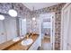 Vintage bathroom with double vanity, mirrored wall decor, and adjacent water closet at 4581 Newcastle Cir, Lithonia, GA 30038