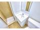 Clean bathroom with tiled shower, vanity, and vintage-style flooring at 4581 Newcastle Cir, Lithonia, GA 30038