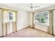 Bright bedroom with large windows, curtains, and ample natural light at 4581 Newcastle Cir, Lithonia, GA 30038
