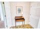 Charming entryway featuring a vintage desk, floral wallpaper, and classic patterned flooring at 4581 Newcastle Cir, Lithonia, GA 30038
