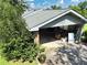 A large detached garage with ample storage space, offering parking and organizational solutions at 4581 Newcastle Cir, Lithonia, GA 30038
