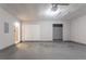 Clean garage area featuring painted concrete floors and ample storage potential at 5867 Heritage Walk, Lithonia, GA 30058