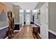 Welcoming hallway with decorative furnishings, hardwood floors, and natural light at 1002 Hallman Sw Ter, Marietta, GA 30064