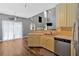 Bright kitchen offers wood floors, stainless steel appliances, and lots of natural light at 1002 Hallman Sw Ter, Marietta, GA 30064