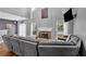 Spacious living area with vaulted ceilings, stone fireplace, and ample seating at 1002 Hallman Sw Ter, Marietta, GA 30064