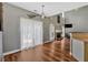 Spacious living room with wood floors, lots of natural light, and a cozy fireplace at 1002 Hallman Sw Ter, Marietta, GA 30064