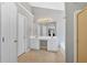 Spacious bathroom includes a vanity with dual sinks, a soaking tub, and a glass enclosed shower at 1002 Hallman Sw Ter, Marietta, GA 30064