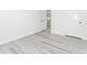 Bedroom featuring hardwood floors, a closet, and white trim at 2023 Jameson Cir, Lawrenceville, GA 30043
