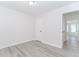 Bedroom with a closet, hardwood floors, and white trim at 2023 Jameson Cir, Lawrenceville, GA 30043