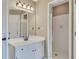 Bathroom with vanity, a shower and lots of lighting at 2031 Greyfield Nw Dr, Kennesaw, GA 30152