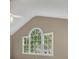 Bedroom with neutral walls features a large window providing natural light at 2031 Greyfield Nw Dr, Kennesaw, GA 30152