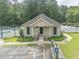 A clubhouse with parking and professional landscaping at 2031 Greyfield Nw Dr, Kennesaw, GA 30152